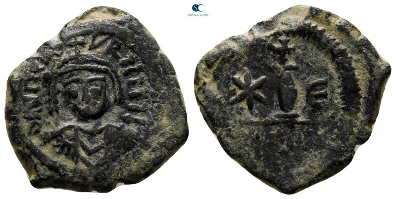 Maurice Tiberius AD 582-602. Constantinople
Decanummium Æ

21 mm., 3,82 g.
...