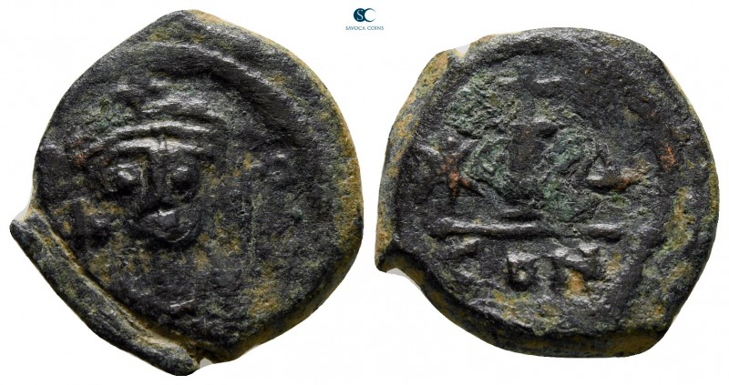 Maurice Tiberius AD 582-602. Constantinople
Decanummium Æ

17 mm., 3,65 g.
...