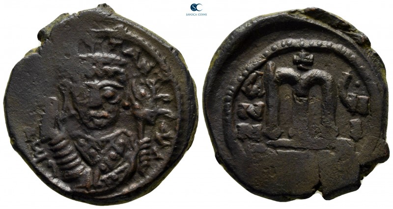 Maurice Tiberius AD 582-602. Theoupolis (Antioch)
Follis Æ

30 mm., 12,84 g....