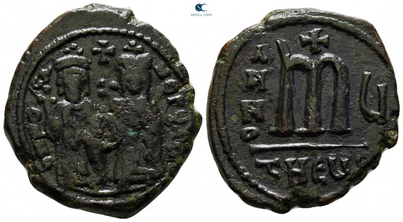 Phocas, with Leontia AD 602-610. Theoupolis (Antioch)
Follis Æ

28 mm., 11,29...