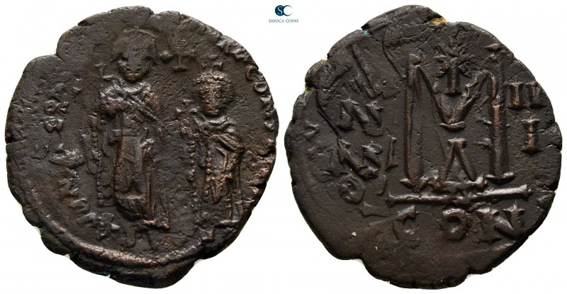 Heraclius with Heraclius Constantine AD 610-641. Constantinople
Follis Æ

29 ...