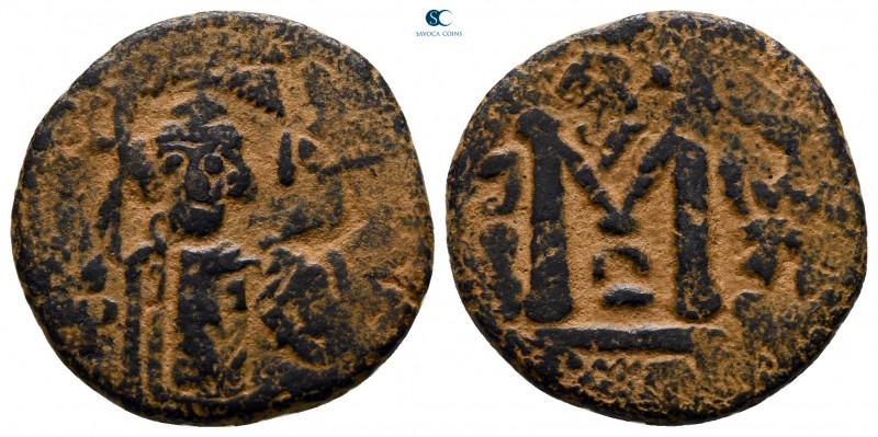 Time of 'Abd al-Malik ibn Marwan AD 685-705. AH 74-80. Hims
Fals Æ

18 mm., 3...