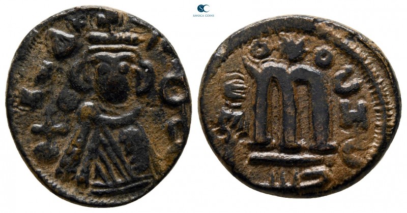 Time of 'Abd al-Malik ibn Marwan AD 685-705. AH 74-80. Hims
Fals Æ

18 mm., 3...