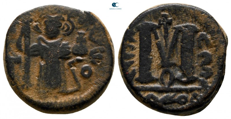 Time of 'Abd al-Malik ibn Marwan AD 685-705. AH 74-80. Dimashq
Fals Æ

18 mm....