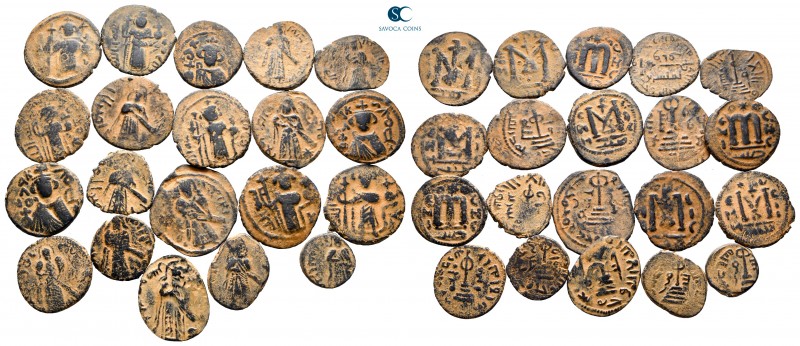 Lot of ca. 20 arab-byzantine bronze coins / SOLD AS SEEN, NO RETURN!

very fin...
