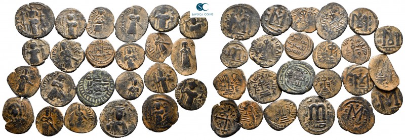 Lot of ca. 23 arab-byzantine bronze coins / SOLD AS SEEN, NO RETURN!

very fin...