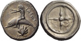 Calabria, Tarentum 
Nomos circa 510-450, AR 7.72 g. TAPAS retrograde Oecist on dolphin l., raising both hands; below, pecten. Rev. Four-spoked wheel....