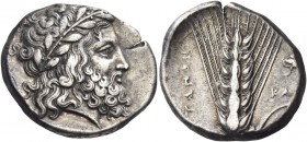Metapontum 
Nomos circa 340-330, AR 7.74 g. Laureate head of Zeus r. Rev. [ME]TAΠON Ear of barley with leaf to r., upon which, poppy and KA[Λ]. Johns...