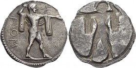 Poseidonia 
Nomos circa 520-500, AR 7.29 g. ΠΟΣ Poseidon bearded, diademed and naked but for chlamys over shoulders, advancing r., hurling trident in...