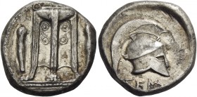 Temesa 
Nomos circa 450, AR 7.78 g. Tripod with three handles, legs ending in lions paws; on either side, grave. Rev. Crested Corinthian helmet r.; b...