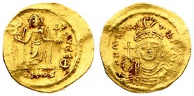 Byzantine 1 Solidus 583 MAURITIUS TIBERIUS 582-602 Solidus 583-601. Av: N mAVRC - TIb P P AVC Cuirassed bust facing wearing crested helmet holding glo...