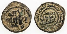 UMAYYAD: AE fals (3.28g), Manbij, ND (ca. 710-720), A-183, W-—, Zeno-130927, reverse legend counterclockwise, very rare mint unknown to Walker for the...