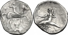 Greek Italy. Southern Apulia, Tarentum. AR Nomos, 280-272 BC. D/ Horseman right, crowning himself; below, capital. R/ Phalantos riding on dolphin left...