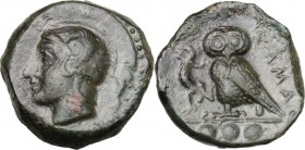 Sicily. Kamarina. AE Tetras, 425-405 BC. D/ Head of Athena left, helmeted. R/ Owls standing left, head facing, holding lizard; in exergue, three pelle...