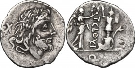 T. Cloelius. AR Quinarius, 98 BC. D/ Head of Jupiter right; behind, dot and X. R/ Victory standing right, crowning a trophy placed on a Gaulish captiv...