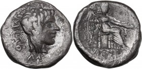 M. Cato. AR Quinarius, 89 AD. D/ Young head right, crowned with ivy wreath, hair long; behind, M. CATO; below, M. R/ Victory seated right, holding pat...