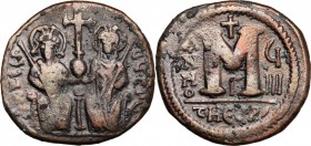 Justin II (565-578). AE Follis, Theoupolis (Antioch) mint. D/ Emperor and his wife seated facing, both crowned, holding scepter in outer hand; between...