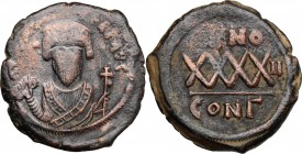 Phocas (602-610). AE Follis, Constantinople mint. D/ Bust facing, crowned, wearing consular robes, holding mappa and scepter topped bx cross. R/ XXXX ...