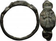 Bronze ring, the bezel engraved with standing figure." Late Roman or Medieval period." Size 19 mm.
