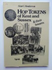 Alan C. Henderson. Hop Tokens of Kent and Sussex. 128 pages (incl. tables). London 1990. EF.