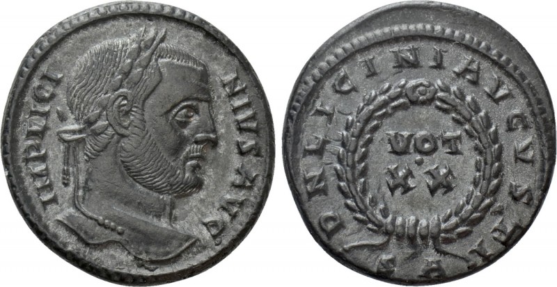 LICINIUS I (308-324). Follis. Arles. 

Obv: IMP LICINIVS AVG. 
Laureate head ...