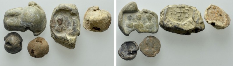 5 Roman Lead Seals. 

Obv: .
Rev: .

. 

Condition: See picture.

Weigh...