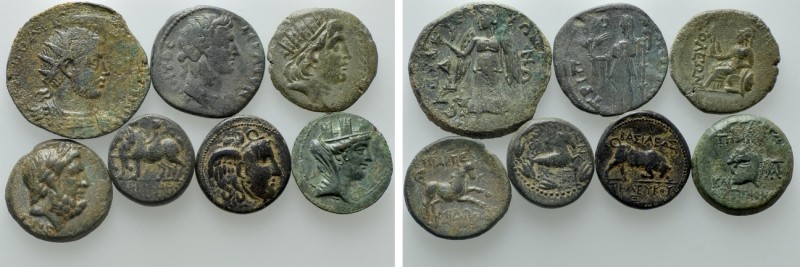 7 Greek and Roman Provincial Coins. 

Obv: .
Rev: .

. 

Condition: See p...