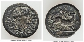 CARIA. Orthosia. Pseudo-Autonomous Issues. Ca. AD 1st century. AE (15mm, 3.01 gm, 7h). VF. Ca. AD 81-96. ΟΡΘΩ-CΙΕΩΝ, head of Dionysus right, wreathed ...