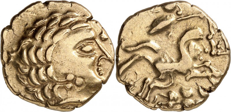 GAULE
Aulerques Cenomans, (IIème siècle av. J.C.). Statère d’or.
Av. Tête laur...