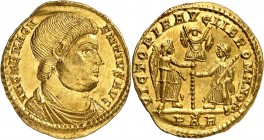 EMPIRE ROMAIN
Magnence (350-353). Solidus 351-353, Arles.
Av. Buste drapé à droite. Rv. Victoire et Liberté debout tenant ensemble un trophée.
RIC....