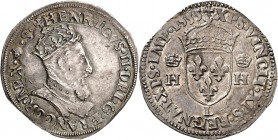 FRANCE
Henri II (1547-1559). Teston 1555 L, Bayonne.
Av. Buste couronné et cuirassé à droite. Rv. Écu de France couronné accosté de deux H couronnés...