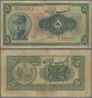 Iran: Bank Melli Iran 5 Rials SH1313 (1934), P.24, small margin splits, toned paper and some strong folds, Condition: F/F-.
 [zzgl. 19 % MwSt.]