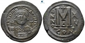 Justinian I AD 527-565. Dated RY 15 (541/2). Constantinople. 4th officina. Follis Æ