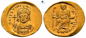 Justinian I AD 527-565. Constantinople. 6th officina. Solidus AV