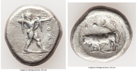 LUCANIA. Poseidonia. Ca. 470-420 BC. AR stater (20mm, 7.43 gm, 9h). Choice Fine. ΠΟΣE, Poseidon striding right, nude but for chlamys spread across sho...