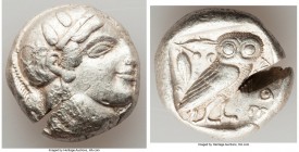ATTICA. Athens. Ca. 465-455 BC. AR tetradrachm (23mm, 17.12 gm, 2h). VF, test cut. Head of Athena right, wearing crested Attic helmet ornamented with ...