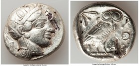 ATTICA. Athens. Ca. 440-404 BC. AE/AR fourree tetradrachm (25mm, 15.08 gm, 6h). Choice VF, core visible, test cut. Ancient forgery of mid-mass coinage...