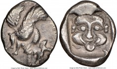 CARIA. Uncertain mint. Ca. 490-470 BC. AR quarter-stater or diobol (12mm, 9h). NGC XF. Forepart of winged bull right / Facing head of gorgoneion with ...