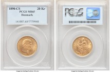 Christian IX gold 20 Kroner 1890 (h)-CS MS65 PCGS, Copenhagen mint, KM791.1. An undeniable gem adorned with silky luster that cascades freely over the...