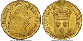 Louis XIV gold Louis d'Or 1690-D MS66 NGC, Lyon mint, KM278.3, Fr-429, Gad-250. Wondrously satiny and revealing a near-tiger's eye effect over velvete...