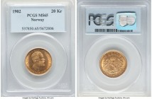 Oscar II gold 20 Kroner 1902 MS65 PCGS, KM355. A well-preserved example featuring free-flowing satin brilliance highlighting the peripheries. 

HID098...