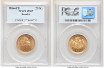 Oscar II gold 20 Kronor 1886-EB MS67 PCGS, KM748. Graced with fine die polish to serve as an indicator of pristine originality, the surfaces otherwise...