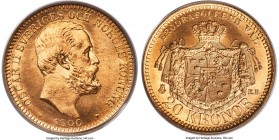 Oscar II gold 20 Kronor 1900-EB MS67 PCGS, KM765. A radiant jewel with no disturbances to deter the eye and a sheer quality of preservation that place...