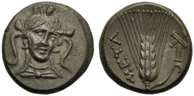 Lucania, Bronze, Metapontion, c. 300-250 BC AE (g 4,11 mm 17 h 12) Head of Athena three-quarters facing r., wearing triple-crested helmet, Rv. META, b...
