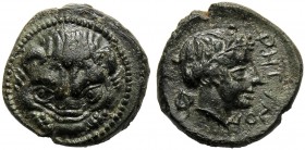 Bruttium, Bronze, Rhegion, c. 415-387 BC AE (g 1,79 mm 12 h 1) Facing lion’s head dotted border, Rv. PHΓINO[N], laureate head of Apollo r. at l., ivy ...