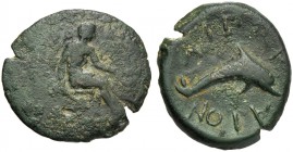 Islands of Sicily, Hemilitron, Lipara, c. 412-408 BC AE (g 7,41 mm 25 h 10) Hephaistos seated r., holding kantharos and hammer, Rv. ΛIΠAPAION, dolphin...