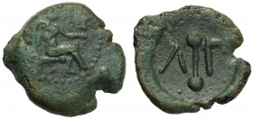 Islands of Sicily, Hexas, Lipara, c. 412-408 BC AE (g 2,03 mm 13 h 4) Hephaistos seated r., holding kantharos and hammer dotted border, Rv. ΛIΠ with t...