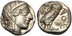 Attica, Tetradrachm, Athens, After 449 BC AR (g 17,23 mm 23 h 9) Head of Athena r., wearing crested Attic helmet, decorated with a olive wreath and pa...