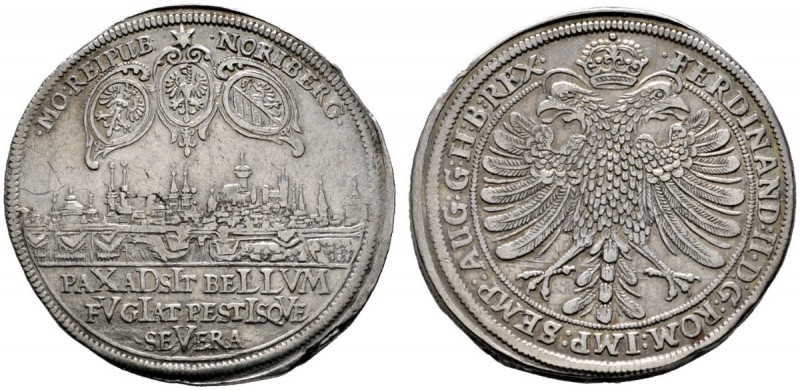 Nürnberg
Taler, sogen. Pesttaler 1633. Stadtansicht von Südosten, darüber drei ...