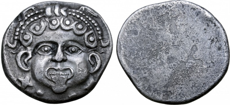 Etruria, Populonia AR 20 Asses. Circa 300-250 BC. Facing head of Metus with curl...